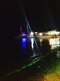 Illuminated street lights at night