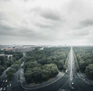 Aerial view of cityscape against sky