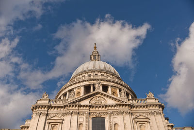 Low angle view of cathedral against cloudy sky