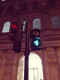 Low angle view of illuminated road sign