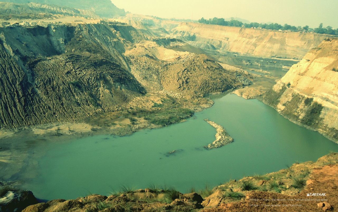 water, mountain, scenics, tranquility, tranquil scene, high angle view, aerial view, beauty in nature, landscape, nature, idyllic, mountain range, sea, river, physical geography, lake, geology, day, non-urban scene, rock formation