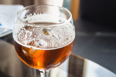 Close-up of beer in glass on table