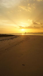 Scenic view of sea at sunset