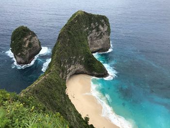 High angle view of rock on sea shore