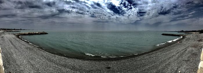 Scenic view of sea against sky during winter