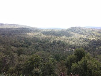 High angle view of trees and mountains against sky