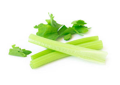 Close-up of vegetables against white background