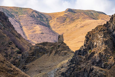 Scenic view of mountain range against sky