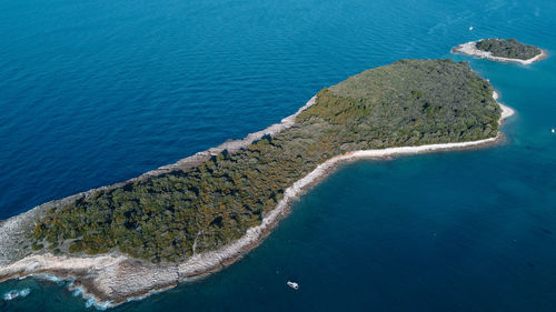 High angle view of rocks on sea