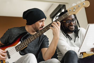 Musicians playing music in studio