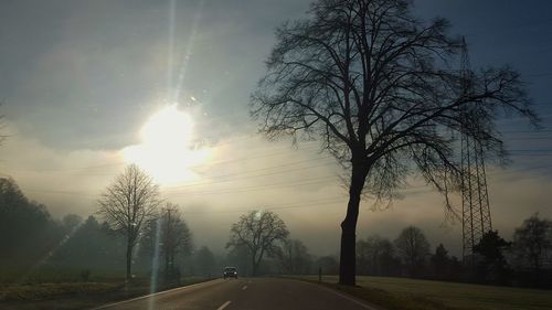 Empty road at sunset