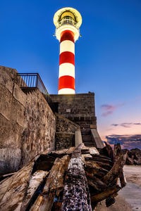 The lighthouse and the broken boat