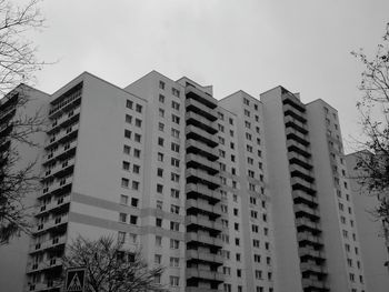 Low angle view of apartment buildings against sky