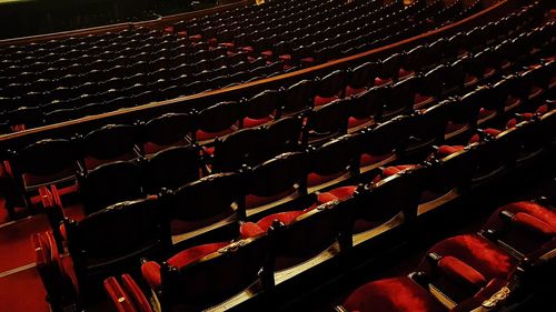 High angle view of empty chairs in stadium