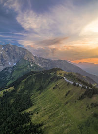 Scenic view of landscape against sky during sunset