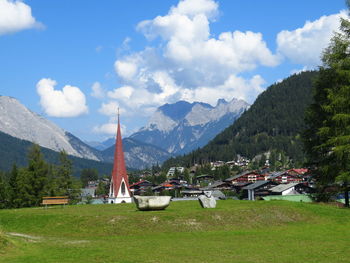 Scenic view of landscape and mountains against sky