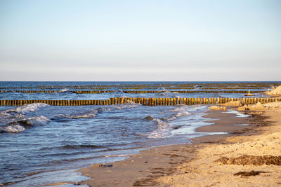 Scenic view of beach against sky