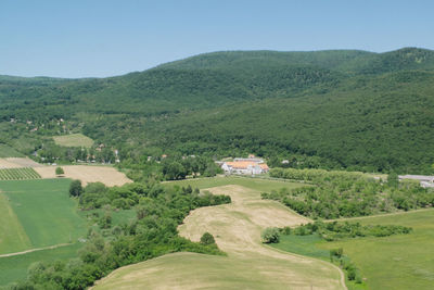 High angle view of agricultural field against clear sky