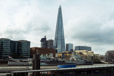 Modern buildings in city against sky