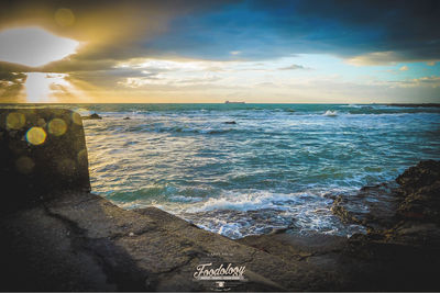 Scenic view of sea against sky during sunset