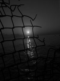 Scenic view of sea against sky at night