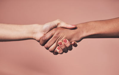 Cropped hand of woman holding hands