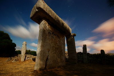 Low angle view of old ruins against sky at night