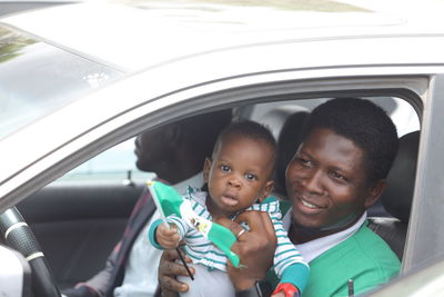 Portrait of boy in car