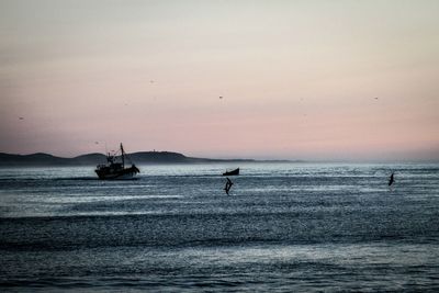 Scenic view of sea at sunset