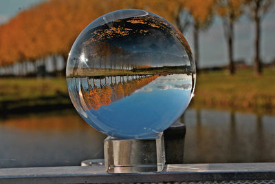 Close-up of crystal ball on water