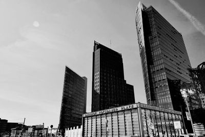 Low angle view of modern buildings against sky