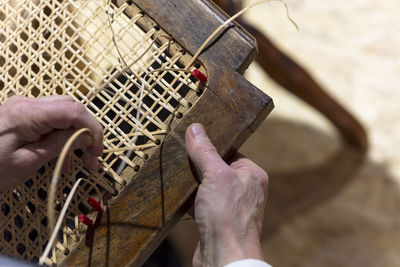 High angle view of man playing piano