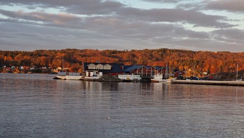 Scenic view of lake against sky during sunset