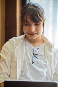 Portrait of a smiling young woman