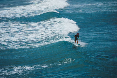 Man surfing in sea