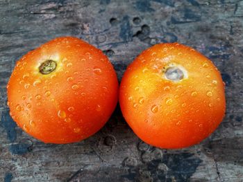 High angle view of orange fruit on table