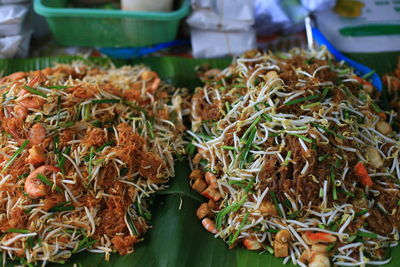 High angle view of food served on banana leaves for sale
