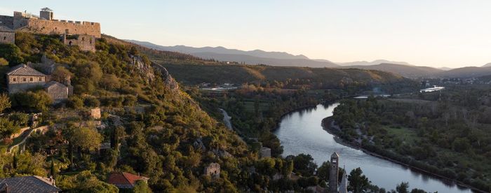 High angle view of river passing through mountains