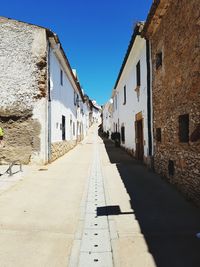 Narrow alley along buildings