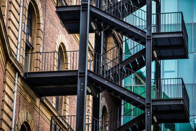 Low angle view of brick building in city