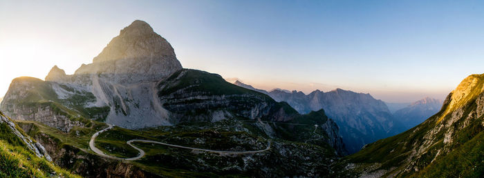 Panoramic view of mountain range against clear sky