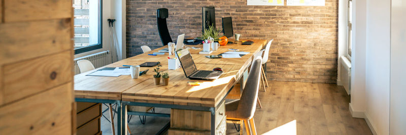 High angle view of chairs on table at home