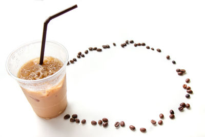 Close-up of coffee cup against white background