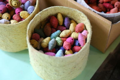 High angle view of various eggs in basket