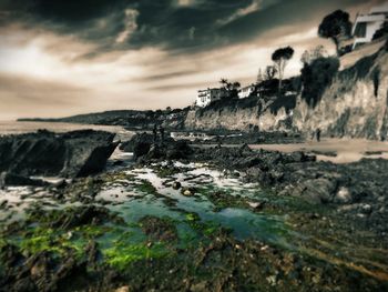 Scenic view of sea against cloudy sky