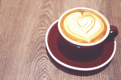 Close-up of cappuccino on table