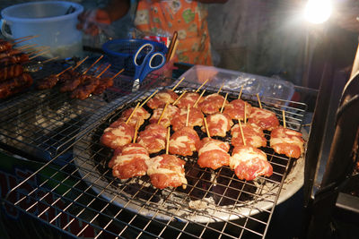 High angle view of meat being cooked on barbecue