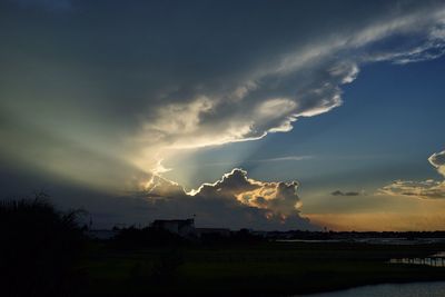 Scenic view of silhouette landscape against sky during sunset