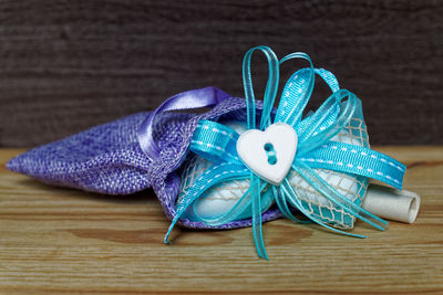 Close-up of jewelry in bag on table