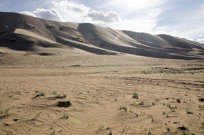 Scenic view of desert against sky